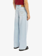 Le Pantalon Baggy En Denim Clair Délavé
